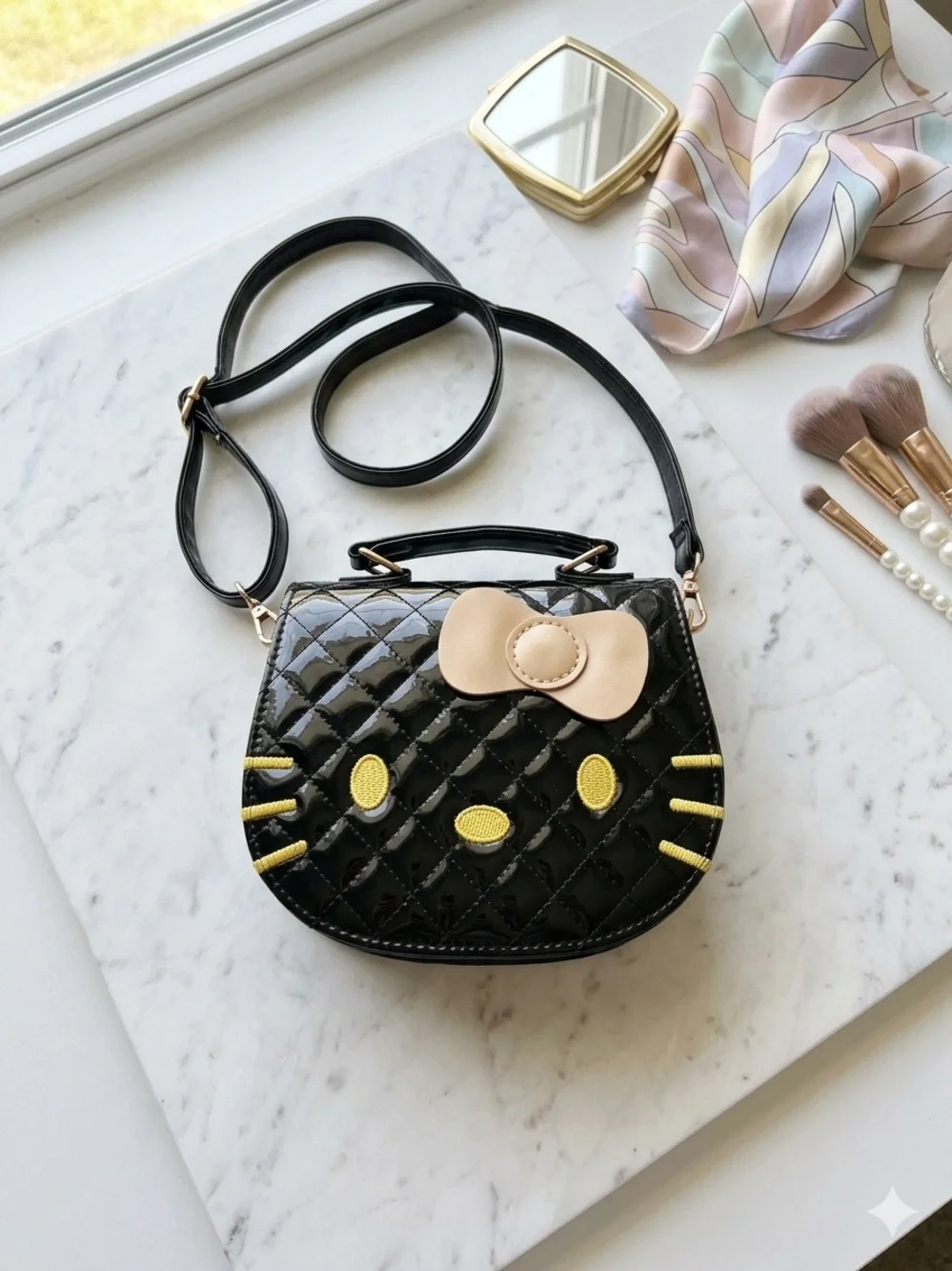 Sanrio Black Patent Hello Kitty Face Crossbody Bag with Gold Bow